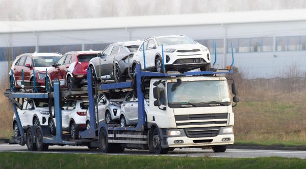 car-carrier-truck-transporting-new-cars-sale_782515-16134