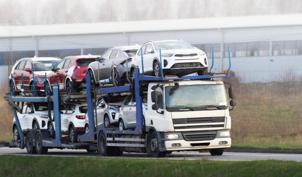 car-carrier-truck-transporting-new-cars-sale_782515-16134