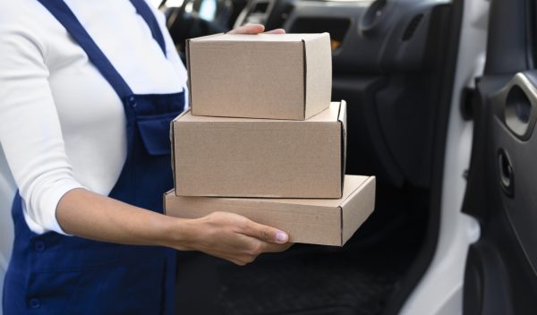 side-view-woman-carrying-boxes_23-2149908132